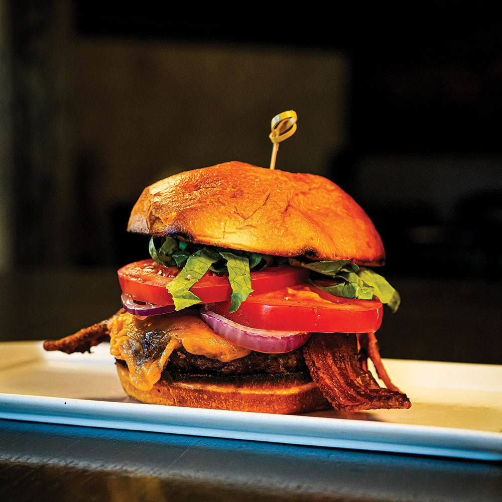 8oz american wagyu beef, cheddar, red onion, lettuce, tomato, roasted garlic aioli, toasted brioche bun